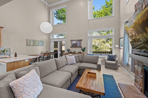 Cozy up with the entire family on the comfortable 12-foot-long couch after a day exploring Snowbasin, Powder Mountain, or Pineview Reservoir.