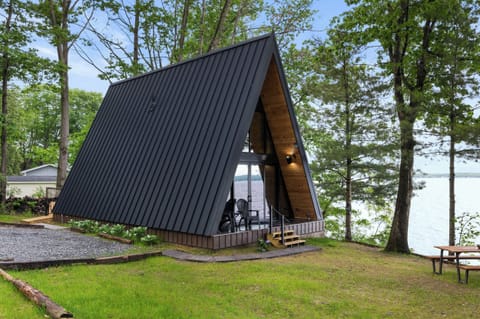 A-frame cabin beside the lake