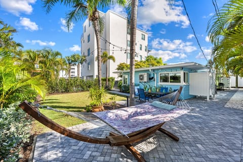 Spend afternoons here with a hammock, shaded patio seating, and tropical surroundings.