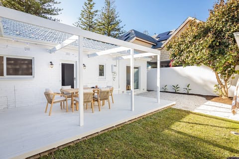 Fire up the BBQ and share long, relaxed meals outdoors under the pergola
