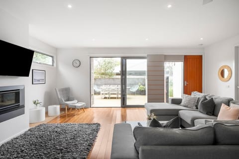 Enjoy seamless indoor to outdoor living with doors opening onto the spacious deck