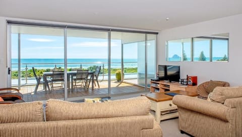 Deluxe Penthouse, Balcony, Ocean View | Living area | Table tennis, books