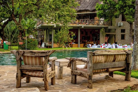 Outdoor pool, pool umbrellas, sun loungers