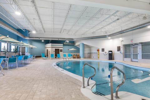 Indoor pool, open 8:00 AM to 10:00 PM, pool umbrellas, sun loungers