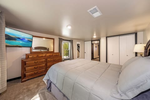 Sink into comfort in your spacious bedroom with quality linens, entertainment TV, and ample storage for your belongings.