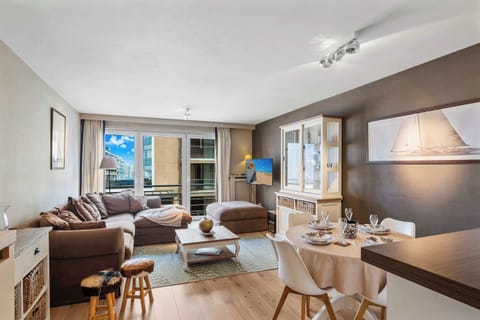 Spacious living room with cozy dining area