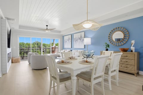 Spacious dining area flowing seamlessly into the living space, perfect for family meals and game nights