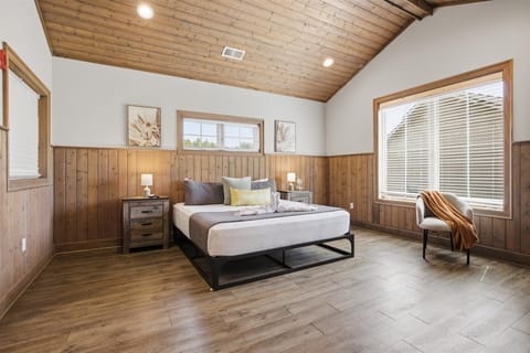 With extra seating and a private ensuite bathroom, the master suite offers a comfortable, well-rounded retreat designed for both relaxation and convenience.