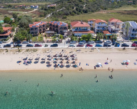 On the beach, sun loungers, beach umbrellas