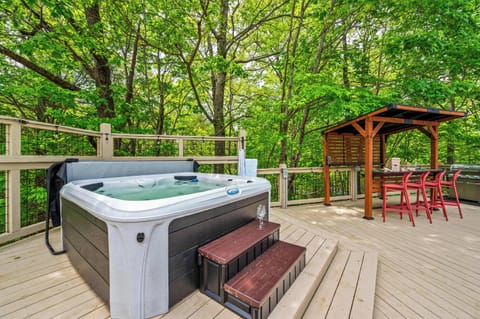 Jets on, worries off. This spacious hot tub sits center stage on the deck, surrounded by lush greenery and fresh mountain air — the ultimate way to end every day.