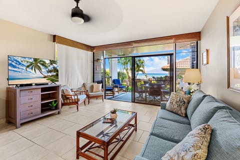 Living room with large sliding doors and ocean views