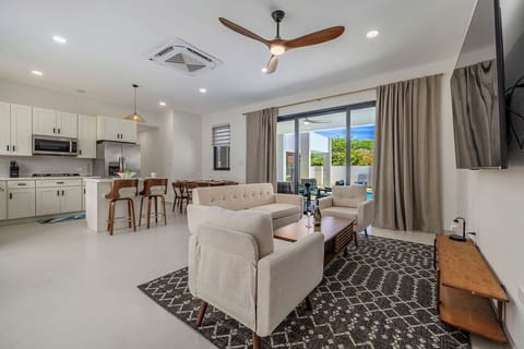 Welcome to your private Aruba retreat tucked along a charming Palm Beach street, where comfort and island living come together effortlessly