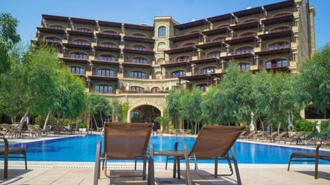 Outdoor pool, open 9:00 AM to 6:00 PM, pool umbrellas, sun loungers