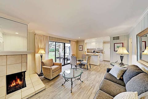Settle into your Napa Valley retreat where a crackling fireplace, plush seating, and open-plan living invite you to unwind after a day of wine tasting.