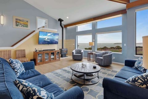 Sink into plush seating and take in sweeping Bodega Bay views from your vaulted great room — the perfect base after a Sonoma Coast wine trail.