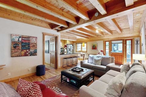 Spread out in your open-concept living space where warm wood beams, hardwood floors, and natural light create an effortless Sonoma wine country basecamp.