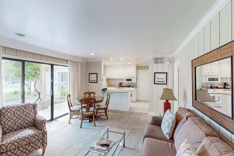 Settle into your sun-filled Napa Valley retreat with an open living area, dining space, and full kitchen — all connected by sliding glass doors to your private patio