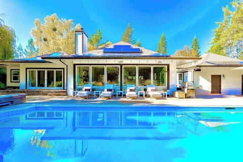 Dive into your private Sebastopol retreat — a sun-drenched heated pool flanked by loungers invites you to unwind between wine country tastings
