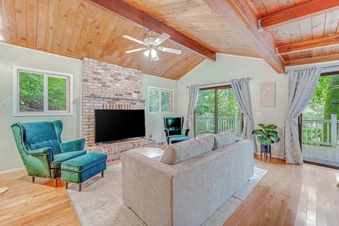 Settle into your vaulted great room where warm wood ceilings, a brick hearth, and plush seating make the perfect spot to recap your Sonoma tasting adventures.