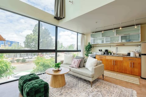Bright open-concept living with city views