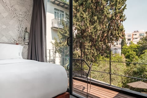 Deluxe Room, 1 King Bed | Premium bedding, down comforters, minibar, in-room safe