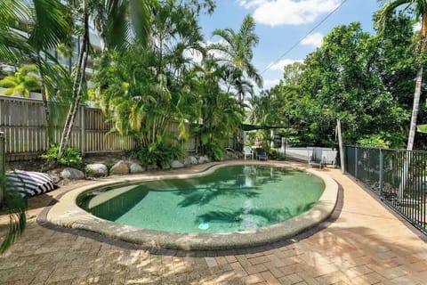 Cool off in the residents’ lagoon-style swimming pool, with day beds to relax in the sun.
