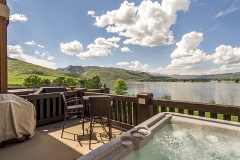 Soak in your private hot tub while overlooking Pineview Reservoir and sweeping mountain vistas—an unforgettable outdoor retreat where relaxation meets breathtaking scenery.