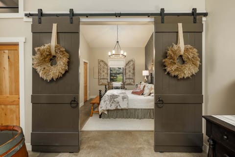 Cozy up in this elegant queen bedroom to recharge for another day in the mountains | Main Level