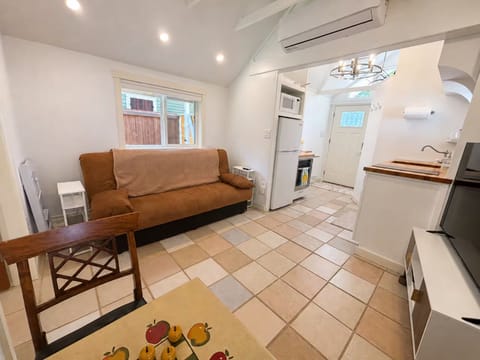 Bright, open-concept living with full kitchen in a thoughtfully designed space