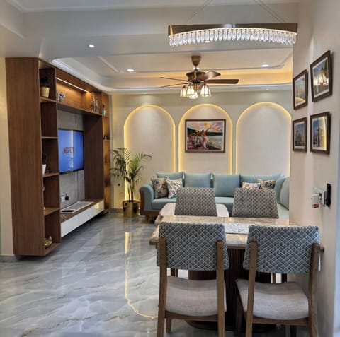 Apartment, Balcony, Mountain View | Living area | Flat-screen TV