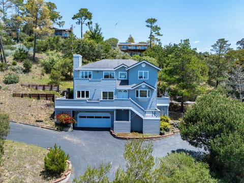 Updated split-level home with driveway and garage parking.
