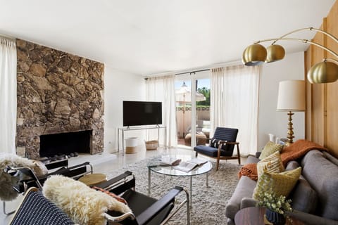Bright and inviting living room with comfortable seating, stylish décor, and plenty of space to relax after a day in the desert sun.
