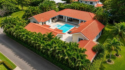 Courtyard pool, tile-roofed villa