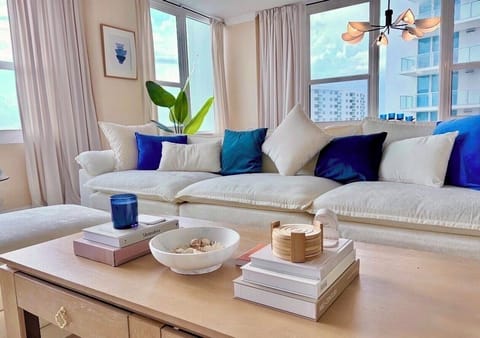 Bright and airy living room and dining area that feels warm and welcoming.