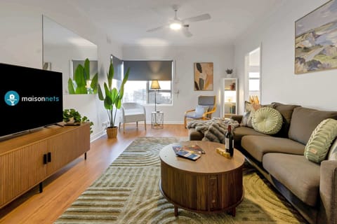 Living room has large flatscreen smart TV.