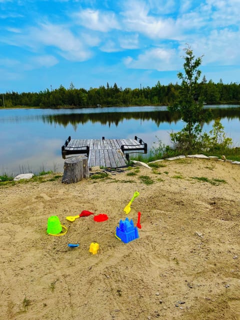 Sandy shoreline and calm waters—perfect for relaxing or family playtime