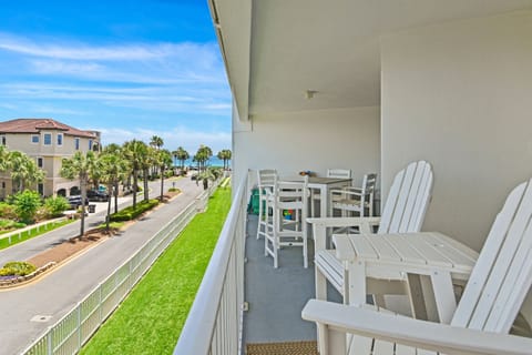 Kick back in balcony seating with a view down to the Gulf.