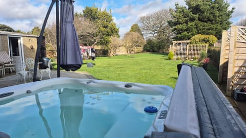 Hot tub located with a view to the large garden