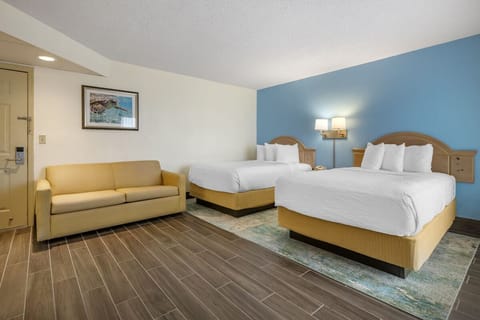 Gather, lounge, and recharge in a spacious two-bed suite.