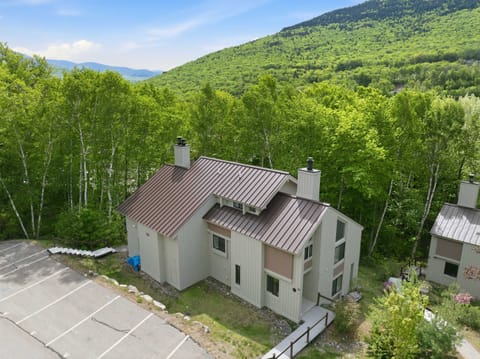 Welcome to Loon Ridge House featuring the dedicated on-site parking right at the door.