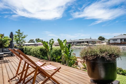 Step out to the expansive waterfront deck, where sun loungers, a private jetty, and peaceful lake views set the scene for slow, relaxed days.