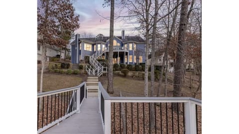 Beautiful spacious lakefront home with private setting and water views.