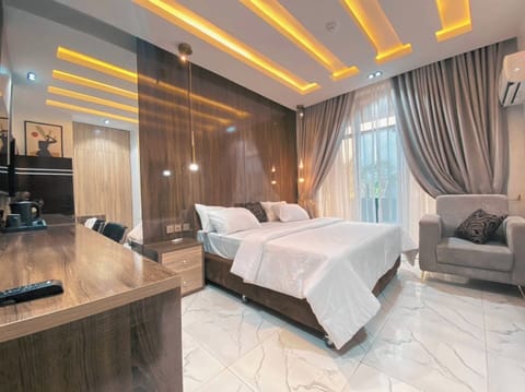 Deluxe Room, Balcony, City View | Desk, laptop workspace, blackout drapes, soundproofing