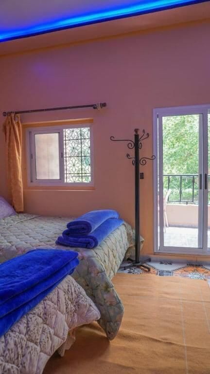 Deluxe Quadruple Room, Balcony | Free WiFi