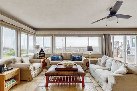 Panoramic windows flood your living room with natural light and frame sweeping views of the Sonoma coastline beyond.