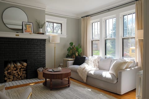 Sunlight pours into this thoughtfully designed living space, where historic charm meets the calm, elevated feel of Maple & Oak Havens. A soft place to land after a day exploring. Perfect for morning coffee, conversation, or a slow unwind.