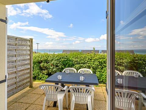 Morning coffee on the terrace with sweeping Bay of Douarnenez views — Pentrez beach is a 10-minute walk