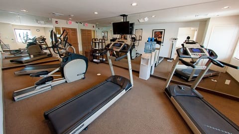 Stay on track with your fitness goals in a bright, well-equipped gym.