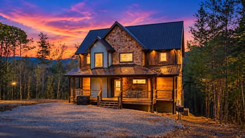 Cozy mountain cabin with wraparound porch and stunning sunset views