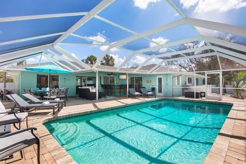Enjoy your own private, screened-in pool - perfect for relaxing any time of day